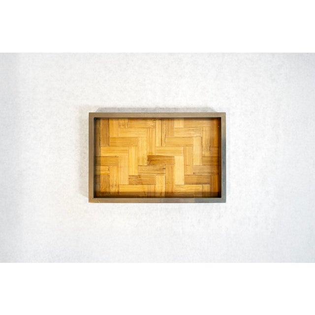 Woven cane tray with metal frame. Manufacturer: Tommaso Barbi 1970s This piece has an attribution mark, I am sure that it...