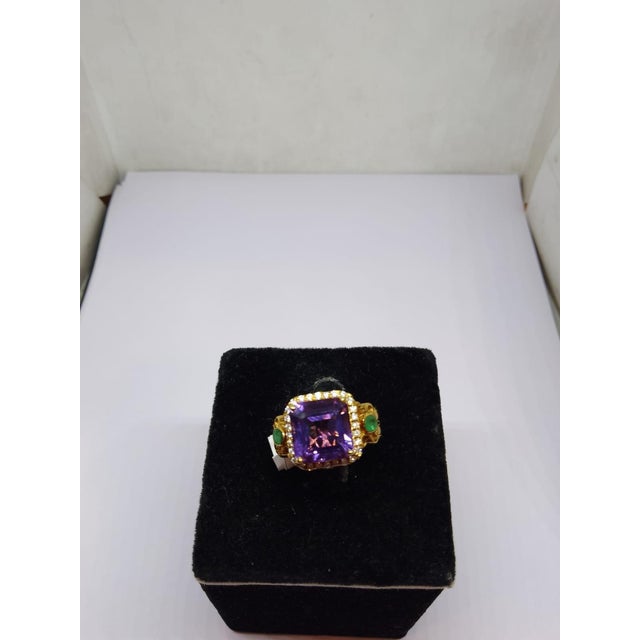 Gold Purity: 18K Solid Gold Amethyst: 4.75 CTS Diamond: 0.25 cts 18K gold Gross weight: 8.47 grams Net weight: 7.47 grams...