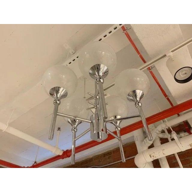 A wonderful French 1970s chrome 5-light fixture with opaline glass globe shades. Newly Rewired.