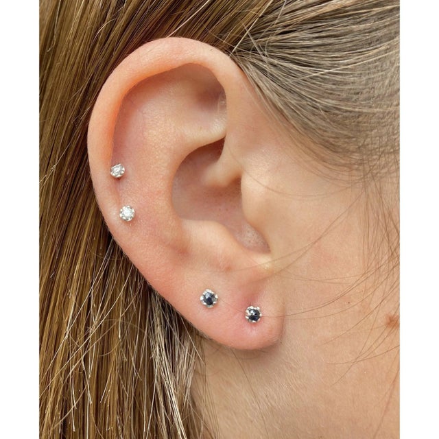 Natural moonlight blue sapphire stud earrings set in 925 sterling silver and 14k white gold plating. Hypoallergenic,...