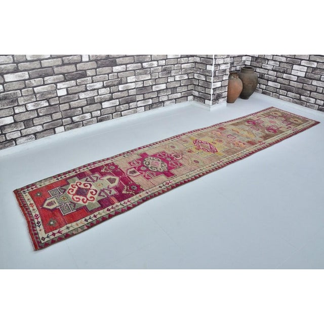 Vintage Anatolian Wool Runner, Hand-Woven Kilim With Rich Magenta and Traditional Tribal Motifs For Sale - Image 9 of 10