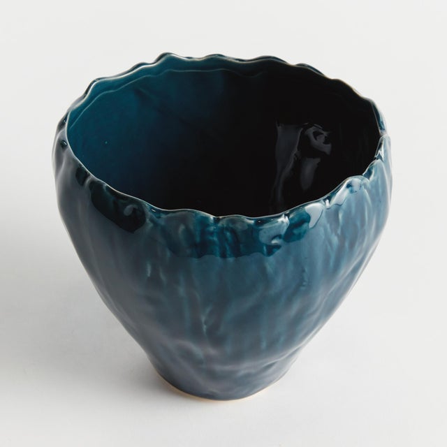In an artisanmade slip cast design, this intricate natureinspired pot is a real treasure. The inherently beautiful glaze...
