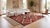 Elevate high-end interiors with this hand-woven modern Navajo-style wool rug, featuring a bold geometric lattice of...