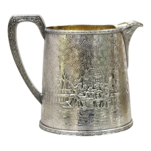 Early 20th Century Derby s.p. Co International Figural Repousse Village Silverplate Water Pitcher
