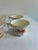 A set of 6 vintage teacups in soft ivory china, decorated with a painterly floral motif of orange and pink poppies, yellow...