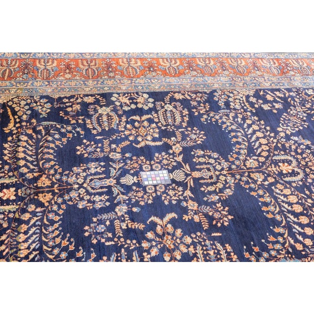 The well-woven village carpets from the Arak/Sultanabad area, especially the red field/navy border, detached floral spray...