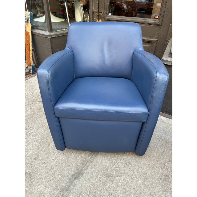 Set of Postmodern Leather Swivel Club Chairs & Ottoman by Schillig, Germany from the 1980s. In excellent condition, the...