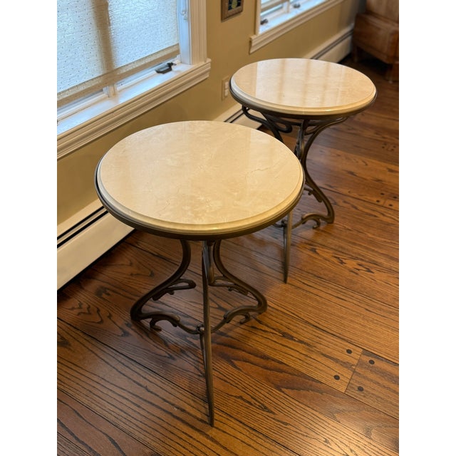 This is a gorgeous pair of mid-century Art Nouveau end tables. The bases are cast brass with beautiful details and hand...