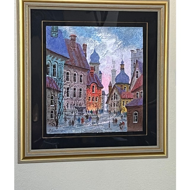 This large framed serigraph by Ukrainian artist Anatole Krasnyansky depicts the "Street of Old Warsaw". Painted in 1994....