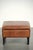 This sheepskin ottoman is versatile, features a warm cognac color, and is finished with black piping. A footstool, also...