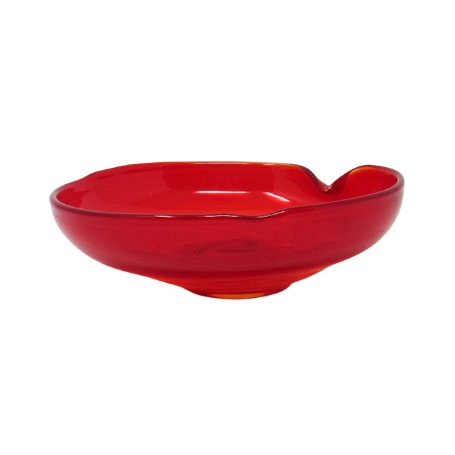 Beautiful vintage mid-century hand-blown art glass ashtray in vibrant translucent ruby red. The ashtray features a clean...