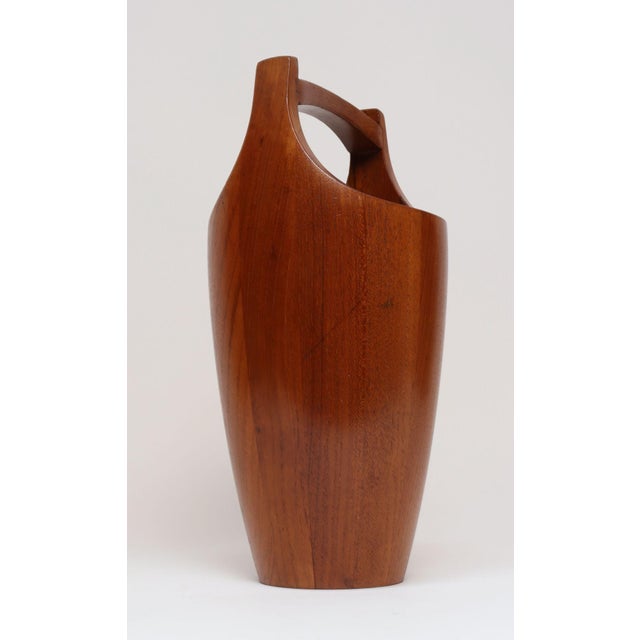 Dansk 'Congo' ice bucket in staved teak designed by Jens Quistgaard for Dansk. Iconic, sculptural early example with...