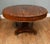 Elegant antique late Regency mahogany drum table featuring a circular top with a beautifully figured mahogany surface and...