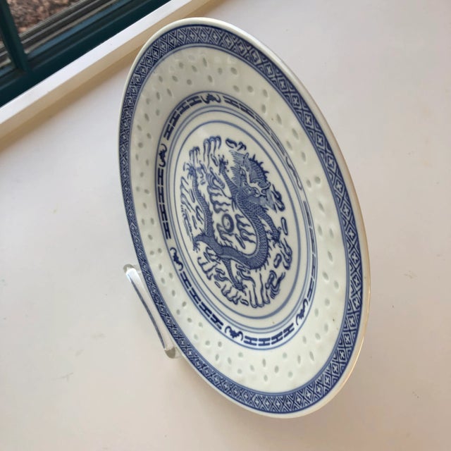 90's blue and white dragon design porcelain plate 10"D , makers mark reads " Made in China" Excellent unused condition.