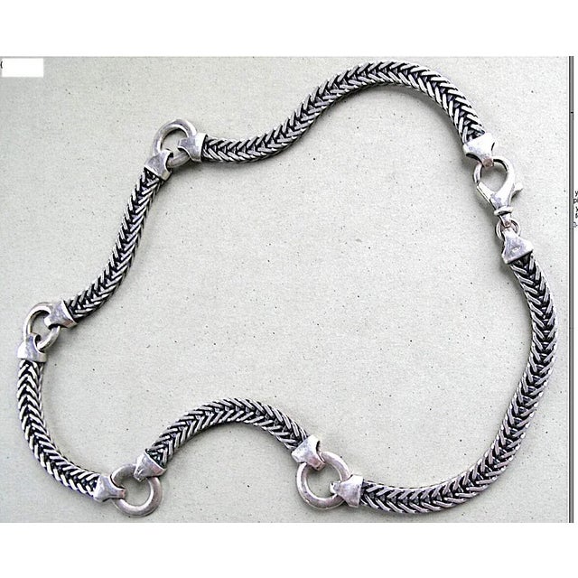 This is part of Chairish’s Costume Jewelry assortment. Mid 20thc Italian Modernist heavy weight sterling silver woven...