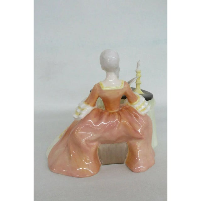 This classic figurine is made of bone china / porcelain. This gorgeous figurine is stamped as being made in England by the...