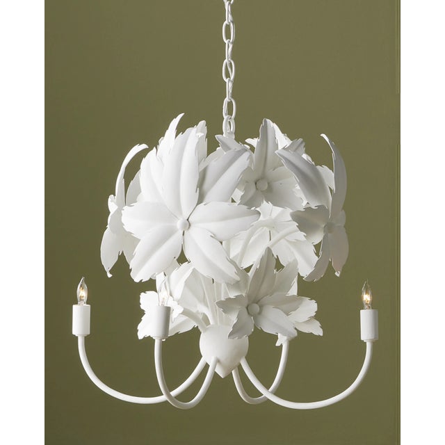 Tom Caldwell designed the Sweetbriar Chandelier, his inspiration a Griffon Begonia in his wife's garden. The leafy plant...