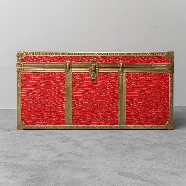 Gold-plated metal trunk with red leather upholstery. Condition as shown in photos.