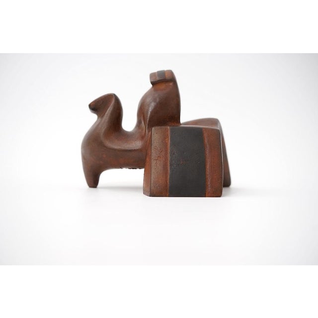 Artist: Gertraude Zebe (Berlin 1938 - lives in Berlin) Object: Zezootie & Rider Material: Cast iron, patinated Dated: 1997...