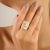 Radiate elegance and warmth with this Rose Gold Art Deco Statement Ring, featuring a luminous emerald-cut cubic zirconia...