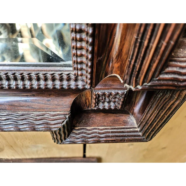 Large mirror Napoleon III, Molding the GUILLOCHET, wood effect embossed beveled mirror. Very good state.