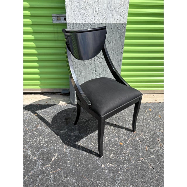 This is a nice labelled set of 6 Pietro Costantini for Ello dining chairs. They feature a black finish and black...