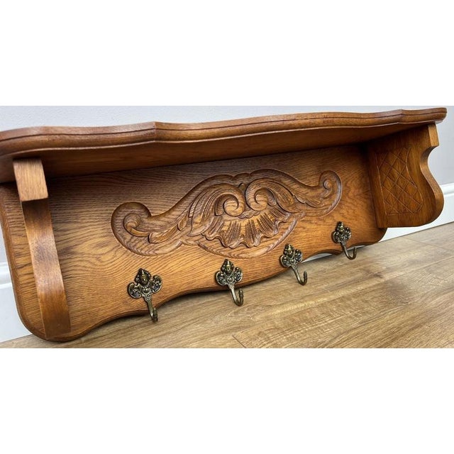 Enhance your hallway or entrance with this Vintage French coat hanger , featuring a beautifully carved central decorative...