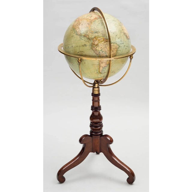 A German 12? terrestrial library globe by Wagner & Debes, Lehrm-Anst, of Leipzig on a mahogany tripod base with baluster...