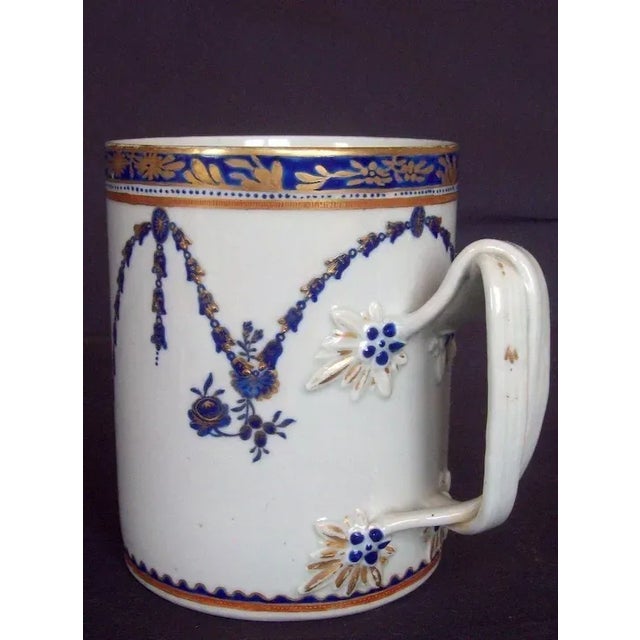 Large antique early 19th c. Chinese export porcelain tankard mug for the American Federal market. Decorated with a central...