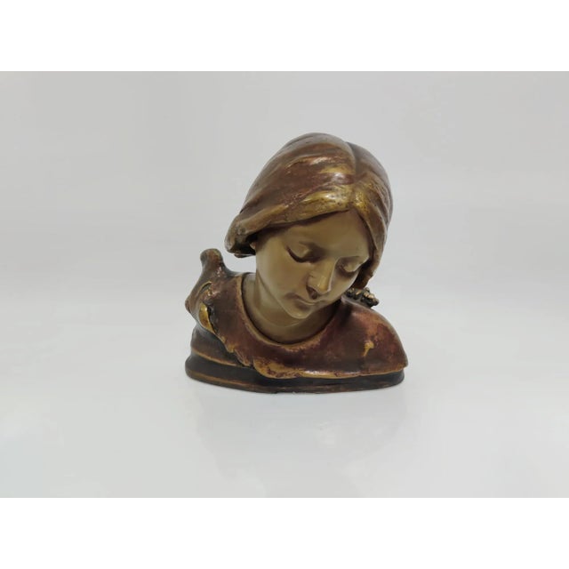 Made in bluing, signed and stamped stucco. Interior wooden base. This piece has an attribution mark, I am sure that it is...