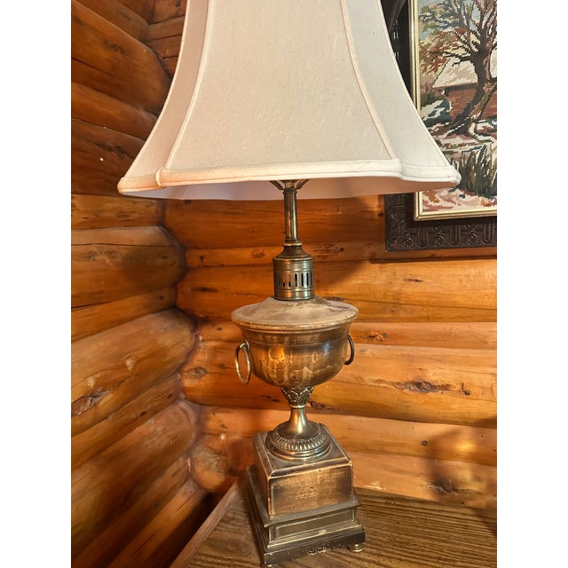 Inject timeless Hollywood Regency sophistication into your space with this striking vintage mid-century table lamp by...