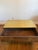 A striking vintage brass-clad campaign-style coffee table handcrafted in Spain by Sarreid Ltd., one of the premier...