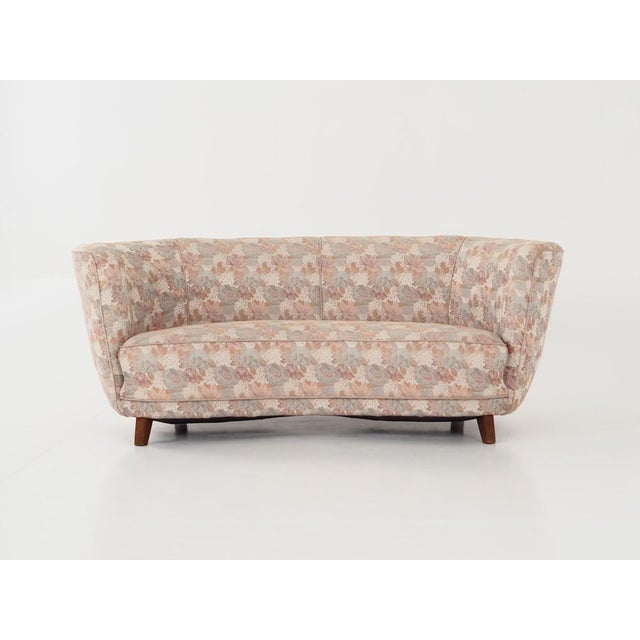 The sofa was made in the 1970s, Danish production. Legs made of solid beech wood. The sofa is preserved in its original...