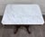 This is a gorgeous late 19th-century Victorian Eastlake / Renaissance Revival center or parlor table crafted in walnut...