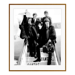 The Beatles Arriving in London Brown Framed Archival Pigment Print For Sale