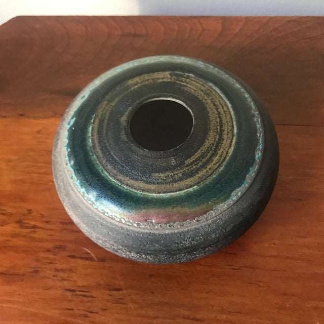 The subtle colors and texture of this vase as absolutely fabulous in person! Signed on the bottom.