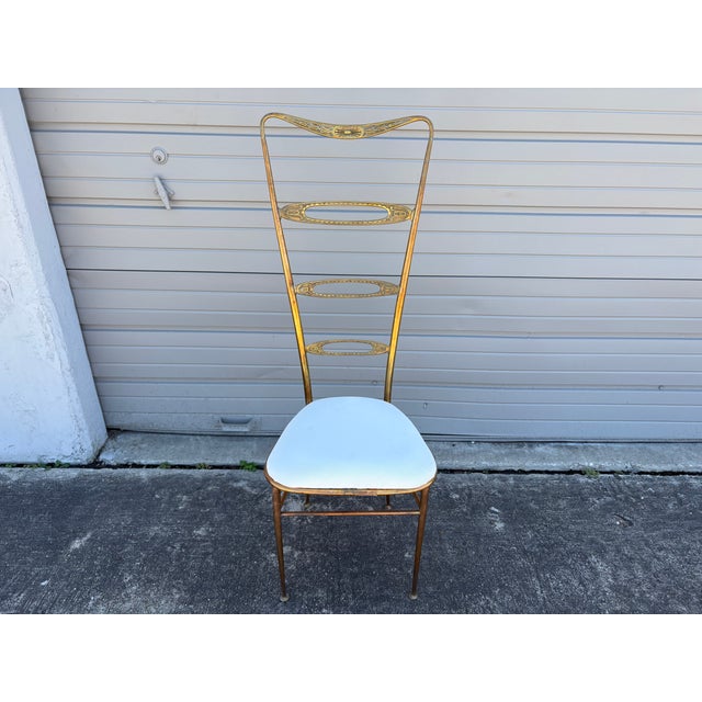 Pair Of Italian Modern Brass Chiavari Chairs. Offered is a great pair of classic mid-century Italian tall back Chiavari...