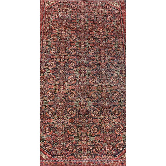 Measures: 2'10 x 5'6. Antique Faraghan fine Persian rug in Navy Color Background And Jewel Tones. Keivan Woven Arts / Rug...