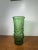 Vintage green art glass vase featuring a unique textured bark-style design. A beautiful retro decorative piece perfect for...