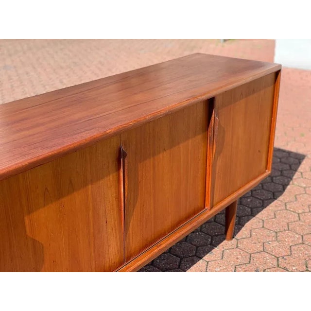 Original 60s! Made in Denmark! Great classic Mid-Century sideboard by Axel Christensen for your Stuga! The piece of...