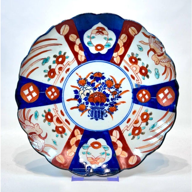 A lovely condition Japanese Imari plate. Hand painted and transfer printed. Cobalt blue and orange panels.
