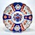 A lovely condition Japanese Imari plate. Hand painted and transfer printed. Cobalt blue and orange panels.