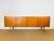 Elegant and timeless, this large Scandinavian sideboard from the 1960s perfectly embodies the minimalist aesthetic of...
