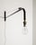 A rare and iconic french mid century wall / swing "potence" jib wall lamp in black lacquered metal attributed to jean...