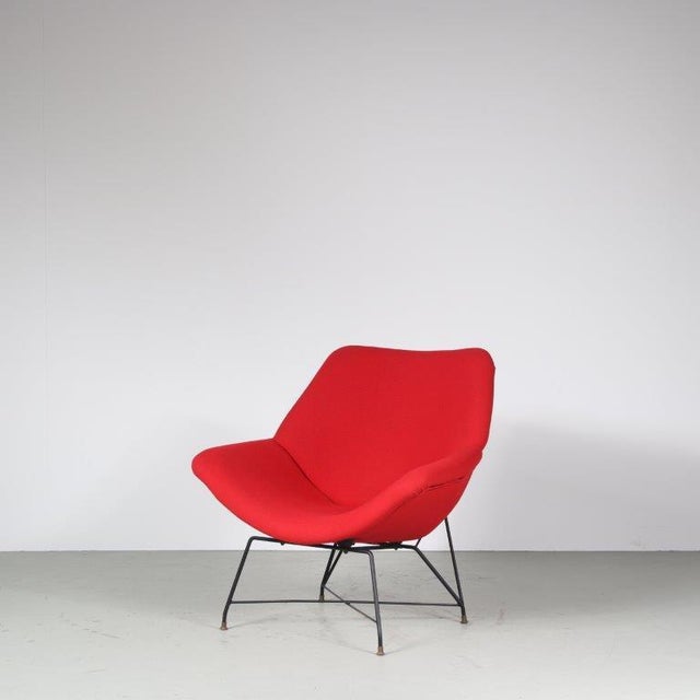 An impressive easy chair by Augusto Bozzi, manufactured by Saporiti in Italy in 1954. This is a very rare and much sought...