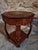 French inlaid side table or sewing table dating from approximately 1930–1950. Crafted from mahogany and contrasting...