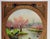 Vintage 1928 Chienmen Cigarette advertising poster. Central image of cherry trees with pink blossoms and lake with ducks....
