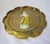 Charming scallop edged Chinese brass tray with the enameled figure of an Immortal. It measures 12"D x .5"H and is in...
