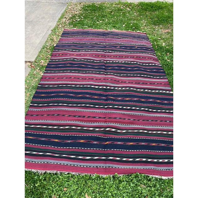 All rugs have been professionally cleaned; original condition is not altered, age-related wear is considered normal in...