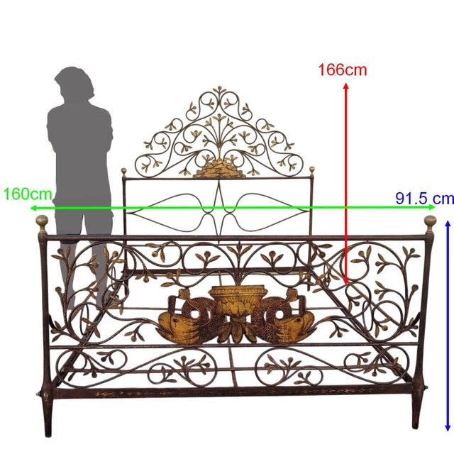 Beautiful burgundy painted iron bed with a rich decoration of dolphins, flowers, and foliage highlighted in gold. Good...